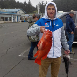 a man standing on a sidewalk